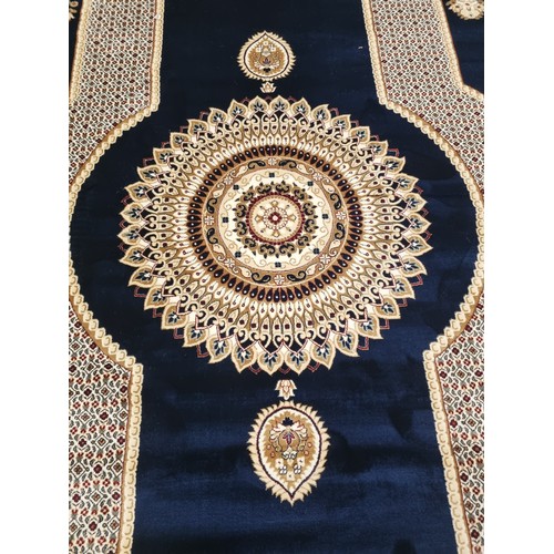 151 - Large full pile, Turkish carpet, blue ground with an all over bespoke lozenge medallion design 5m x ... 