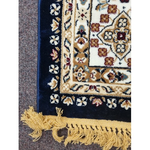 151 - Large full pile, Turkish carpet, blue ground with an all over bespoke lozenge medallion design 5m x ... 