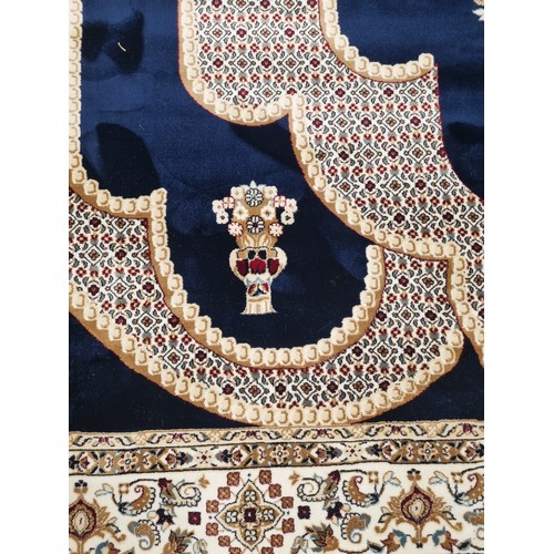 151 - Large full pile, Turkish carpet, blue ground with an all over bespoke lozenge medallion design 5m x ... 