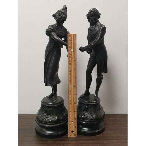 916 - Pair of bronze style sculpture, height 39cm (some damage)