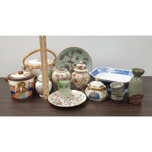 955 - Assorted lot of oriental ware including biscuit barrel and sake set, 11pcs