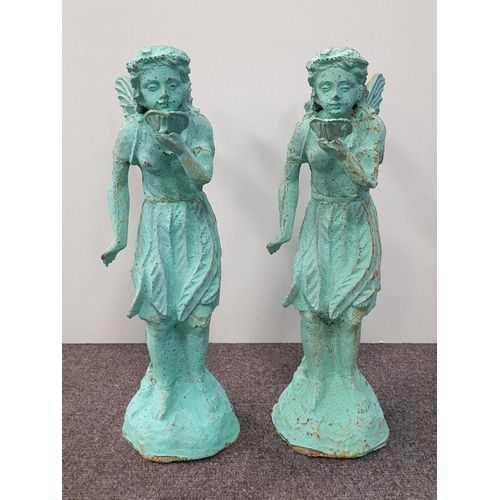 1040 - Pair of cast iron garden ornaments, height 51cm