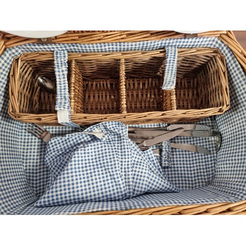 915 - Picnic Basket and contents - H: 18cm x W: 53cm x D: 34cm