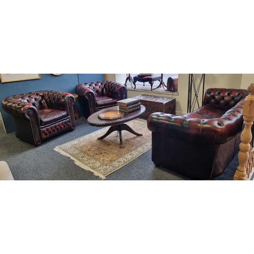 77 - Oxblood Leather Chesterfield Three Piece Suite comprising 3 seater sofa and two armchairs
3 Seater -... 