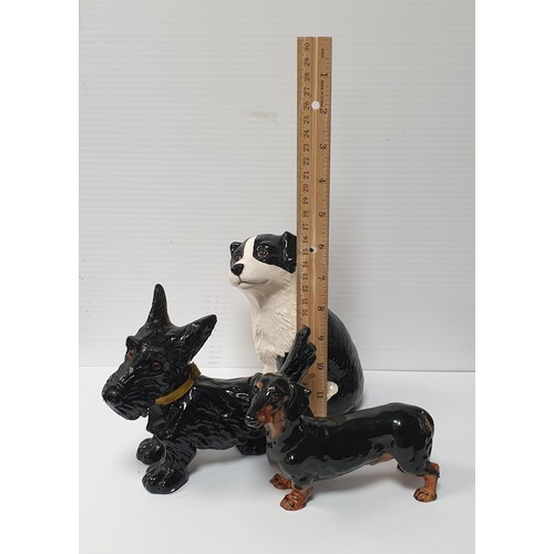 940 - Lot of 3x Dog Ornaments (1x Money Bank and 1x Royal Doulton) Tallest 16cm high