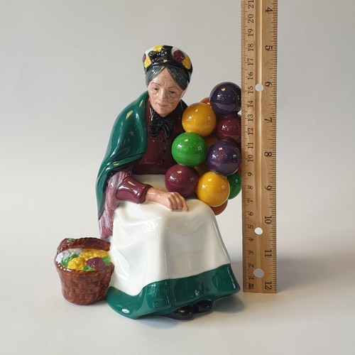 24 - Royal Doulton Old Balloon Seller Ornament, H: 19cm