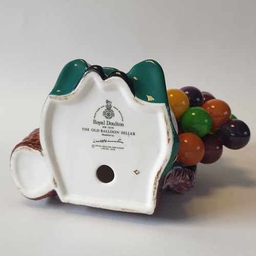 24 - Royal Doulton Old Balloon Seller Ornament, H: 19cm