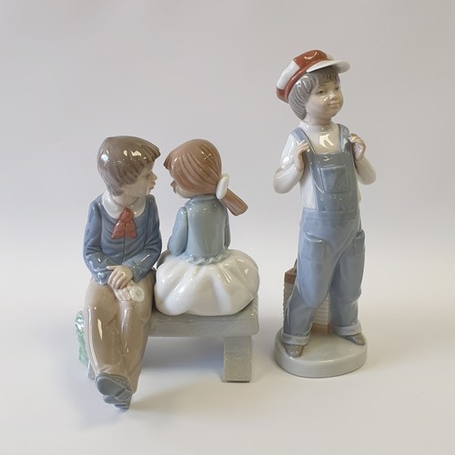 42 - Lot of 2x Porcelain Ornaments, Nao - Seated on Bench and Lladro Tallest: 22cm