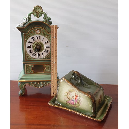 40 - Staffordshire Old Court Ware Lidded Cheese Dish 
and Porcelain Mantle Clock with Key, H:38 x W:19 x ... 