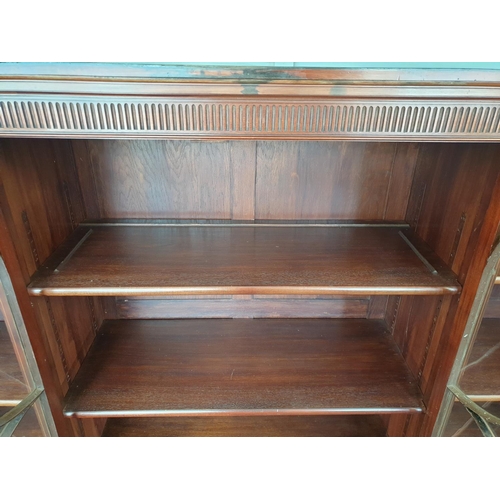 62 - Inlaid Mahogany Four Door Break-Front Bookcase by Maple & Co., H:138 x W:183 x D:43cm