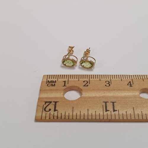 307 - Pair of 9ct Gold and Peridot Earrings