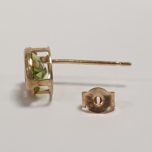 307 - Pair of 9ct Gold and Peridot Earrings