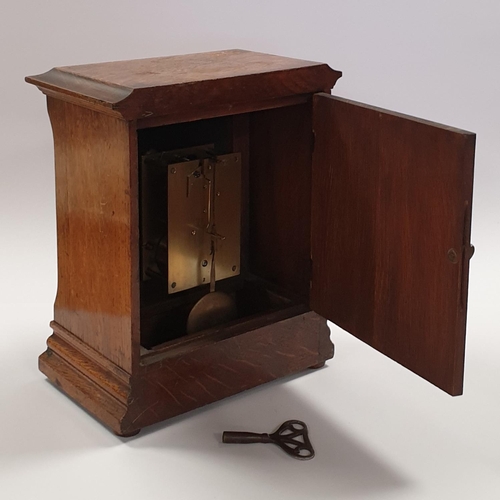 36 - Brass Faced Oak Mantle Clock with Pendulum and Key. H:25 x W:21 x D:13cm
