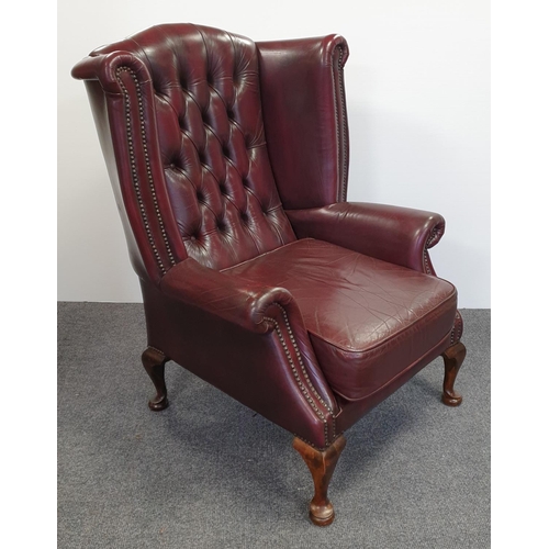 75 - Oxblood Chesterfield Wingback Armchair, H: 107cm x W: 81cm x D: 66cm