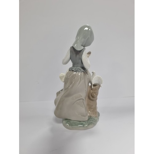 38 - Lladro Figure, Girl with Doves - H: 22.5cm