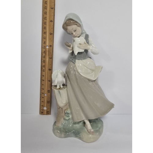 38 - Lladro Figure, Girl with Doves - H: 22.5cm