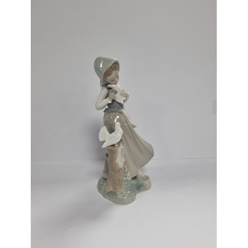 38 - Lladro Figure, Girl with Doves - H: 22.5cm