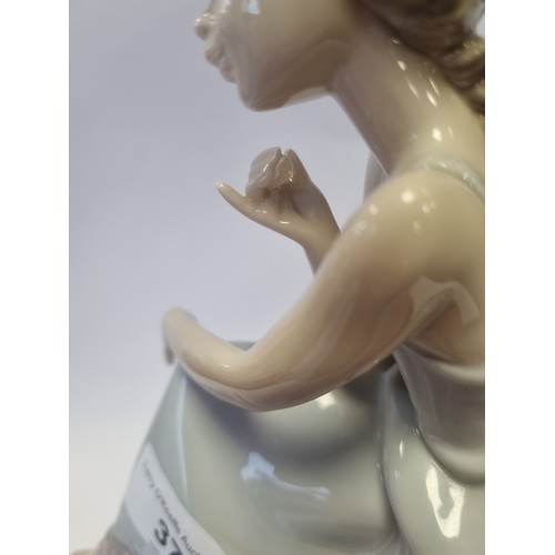 37 - Lladro Figure - Girl Seated on Phone 