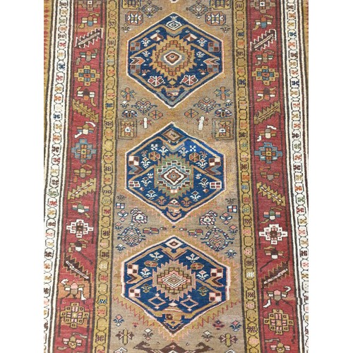 62 - Large Handwoven Persian Heriz Runner with Medallion Design, Northern Iran. 135cm x 415cm