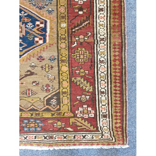 62 - Large Handwoven Persian Heriz Runner with Medallion Design, Northern Iran. 135cm x 415cm