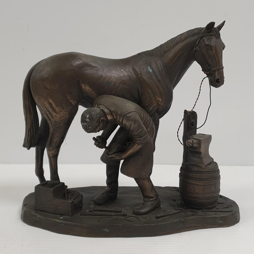 329 - Genesis Ornament - Farrier and Horse. Height 24cm