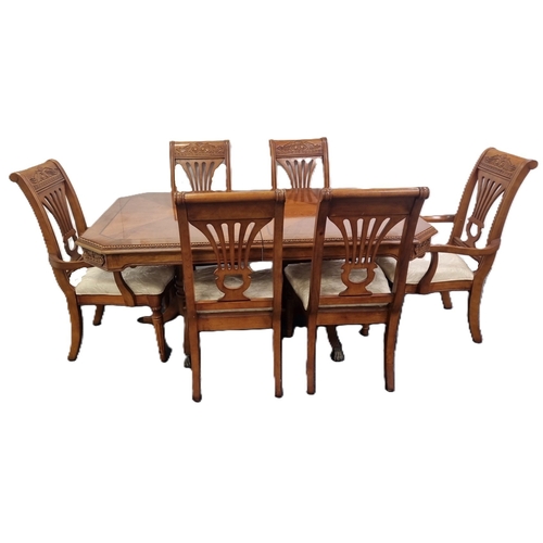 76 - Seven-piece walnut-finish dining suite (table and six chairs) H:76cm x L:173cm x D:114cm.