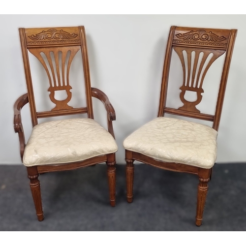 76 - Seven-piece walnut-finish dining suite (table and six chairs) H:76cm x L:173cm x D:114cm.
