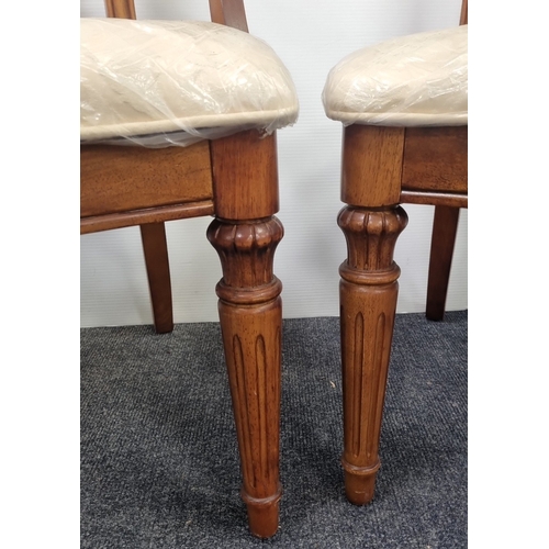 76 - Seven-piece walnut-finish dining suite (table and six chairs) H:76cm x L:173cm x D:114cm.