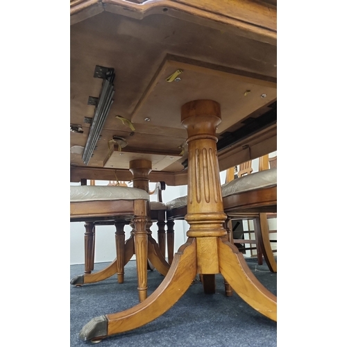 76 - Seven-piece walnut-finish dining suite (table and six chairs) H:76cm x L:173cm x D:114cm.