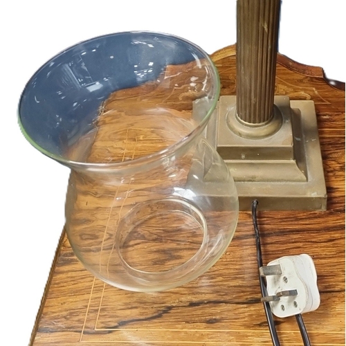 88 - Brass-finish column table lamp with glass reservoir and shade H:75cm x W:17cm.