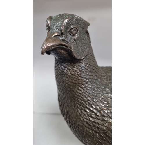 94 - Genesis Pheasant figure on fern base H:29cm.