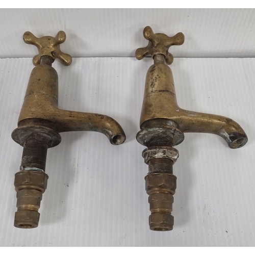 101 - Set of 4 brass taps and basin mixers