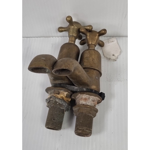 101 - Set of 4 brass taps and basin mixers