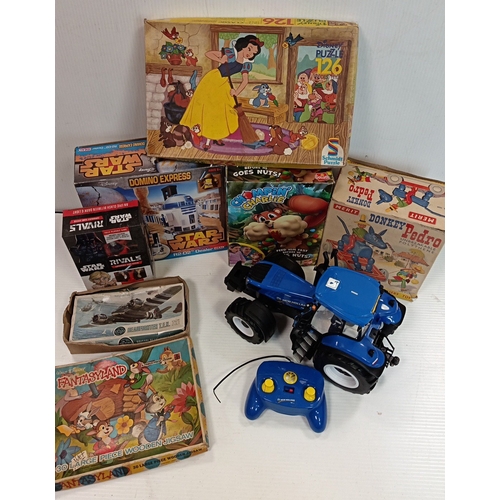 213 - Assorted toys and games incl. New Holland RC tractor, Disney jigsaws, Star Wars sets and Airfix kit
