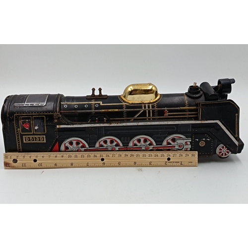 216 - Japanese vintage tinplate model steam locomotive