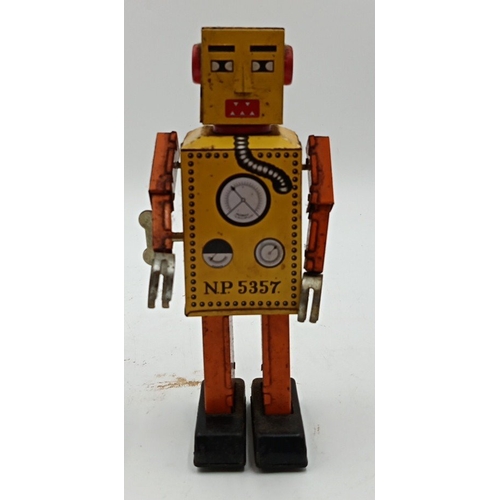 218 - Clockwork tinplate robot toy, 