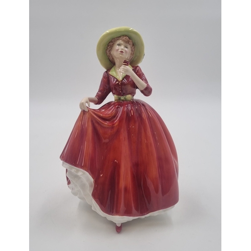 119 - - Set of three Royal Doulton figures—“Southern Belle” HN 2229, “A Single Red Rose,” and “Janet” HN 1... 