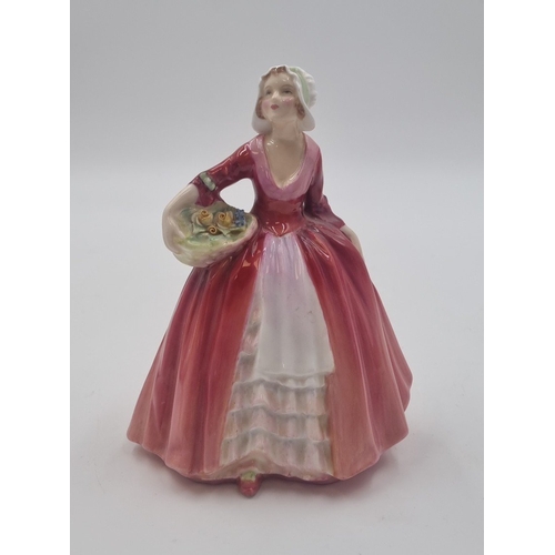 119 - - Set of three Royal Doulton figures—“Southern Belle” HN 2229, “A Single Red Rose,” and “Janet” HN 1... 