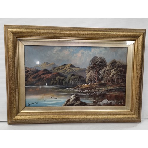 235 - Framed signed oil painting on board of a lakeside/mountain scene, H: 47cm x W: 68cm