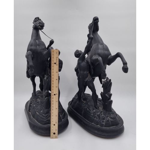 63 - Pair of cast-metal Marley Style Horses, H: 43cm