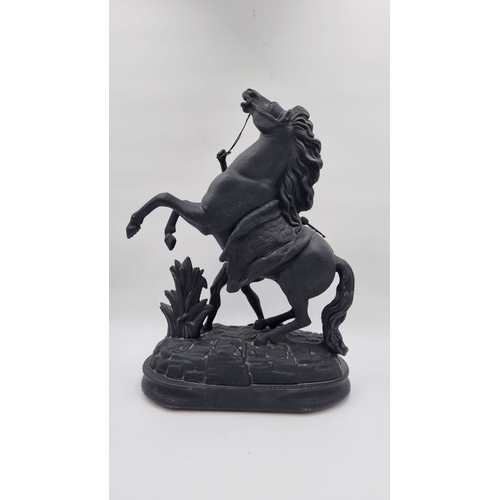 63 - Pair of cast-metal Marley Style Horses, H: 43cm
