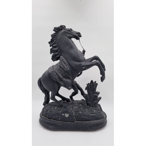 63 - Pair of cast-metal Marley Style Horses, H: 43cm
