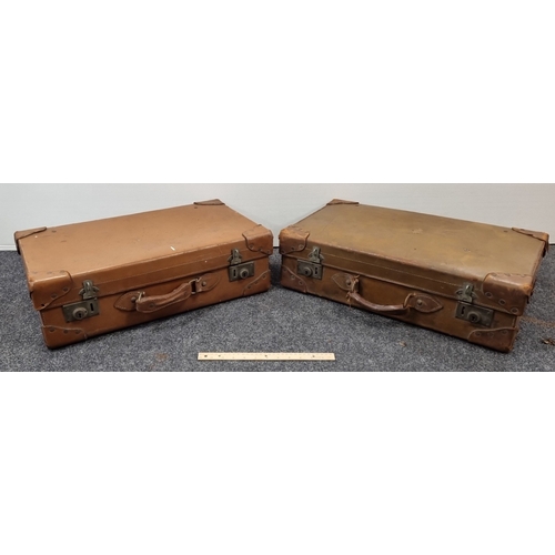 87 - Pair of vintage tan leather suitcases