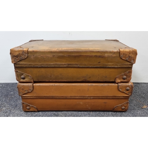 87 - Pair of vintage tan leather suitcases