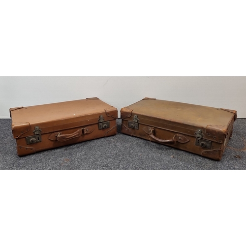 87 - Pair of vintage tan leather suitcases