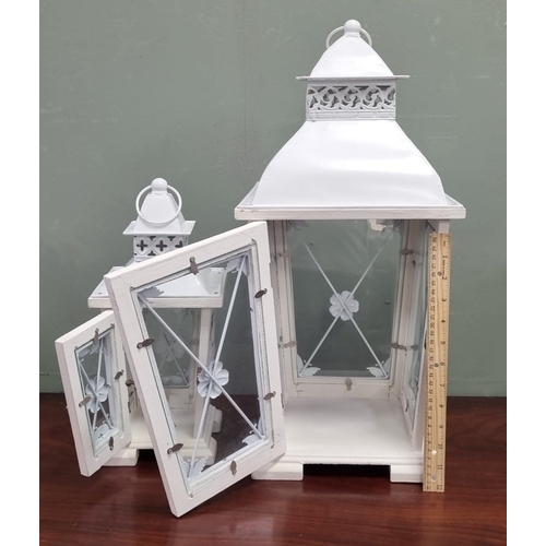 115 - Pair of lantern style candle holders, tallest H: 55cm