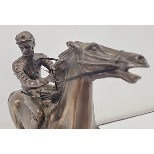 236 - Signed bronze-effect racehorse and jockey figure on oval base