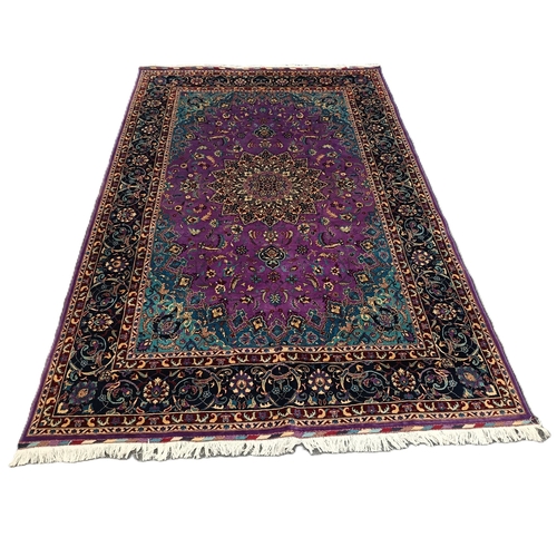 225 - Oriental-style medallion carpet in purple and teal palette, 300cm x 200cm