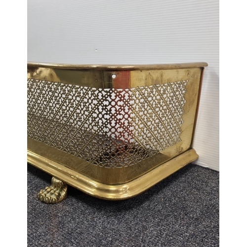 83 - Antique Brass Pierced Fender with Lion Paw Feet H:27cm x W:124cm x D:33cm.