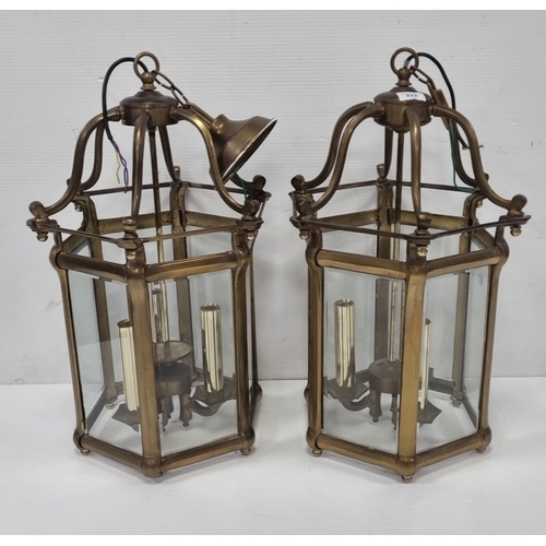 222 - Pair of hexagonal  brass and glass hall lantern pendant lights, H: 60cm (panel light plus chain)